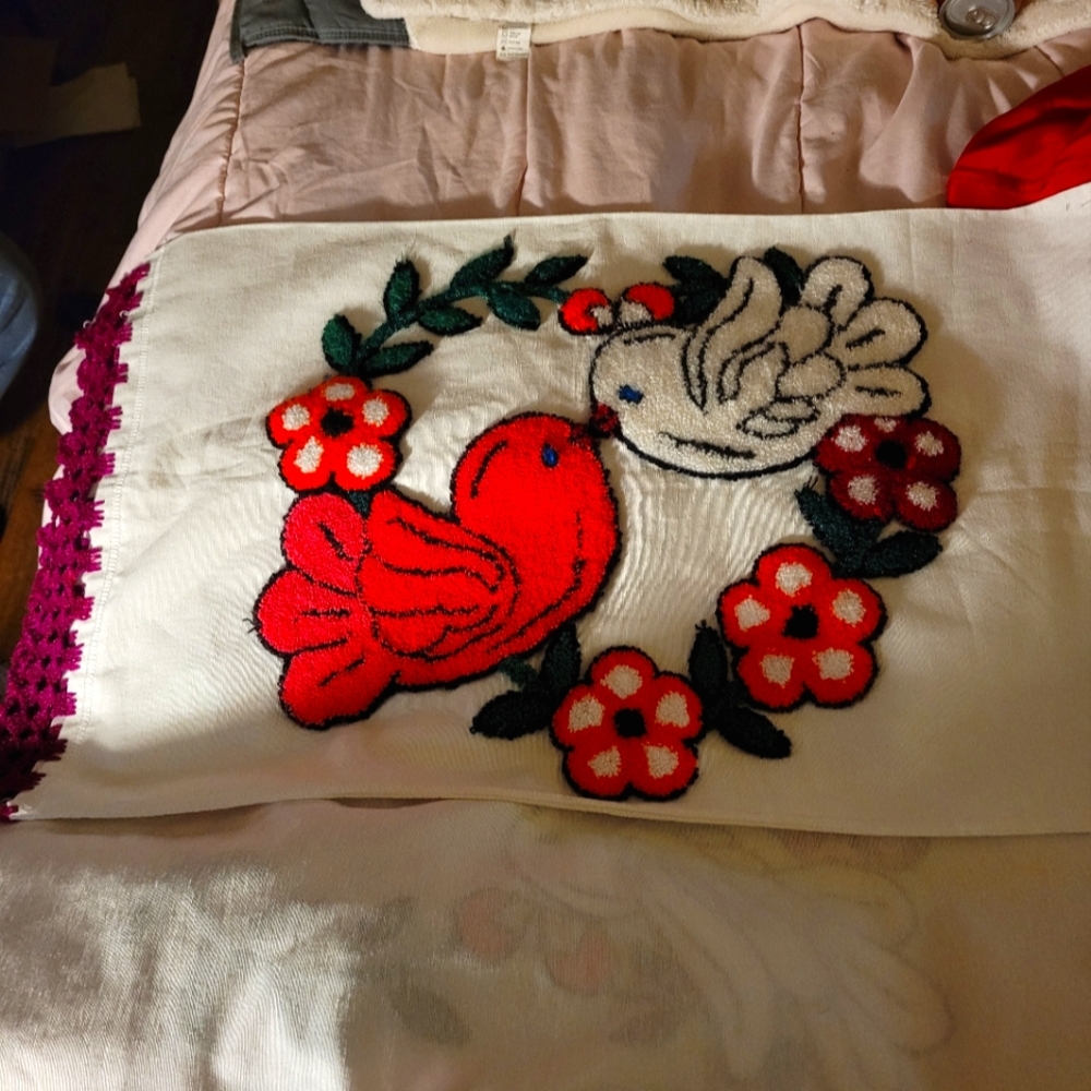 Set of needle punch embroidered pillow cases